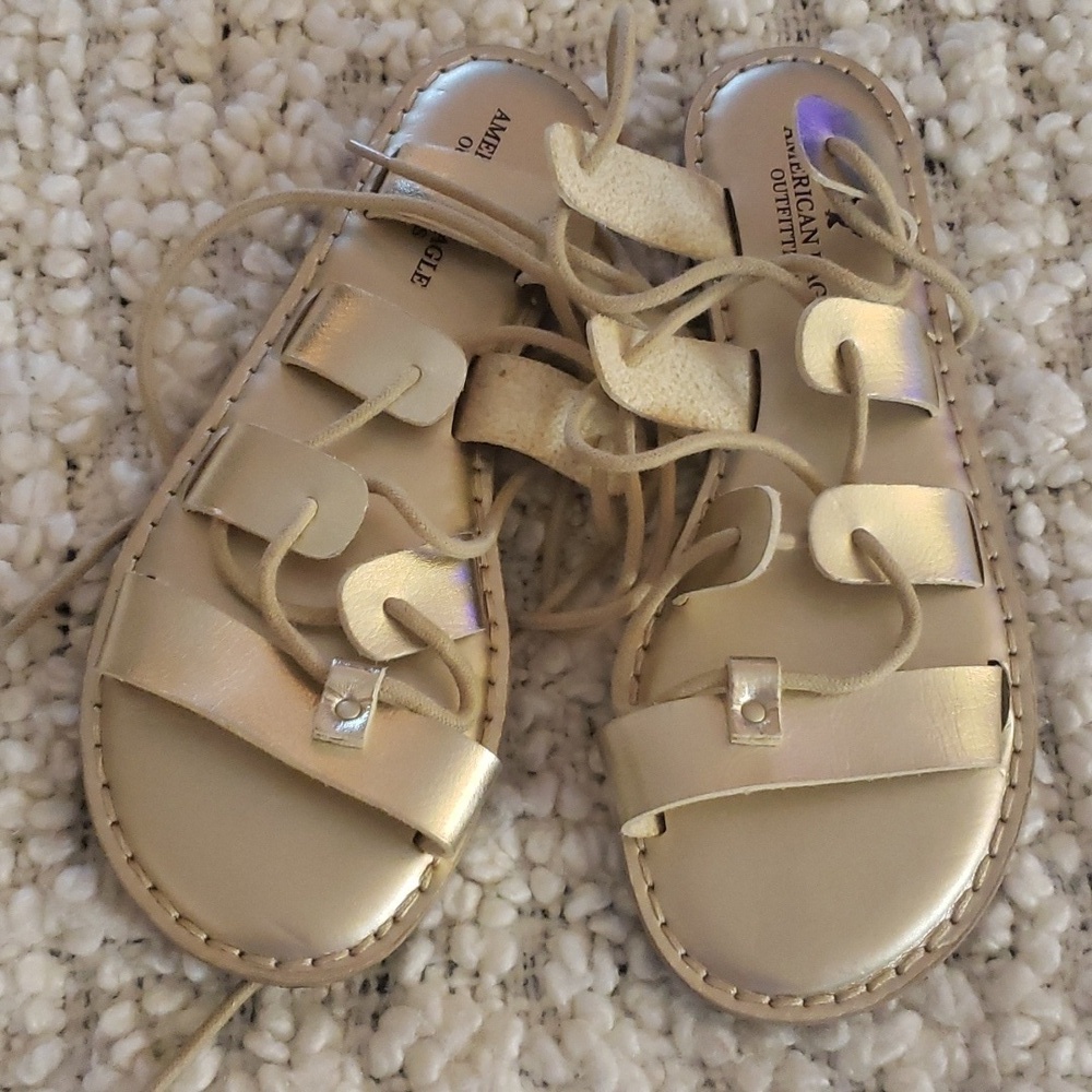 American eagle gladiator gold sandals
